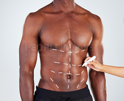 Buy stock photo Plastic surgery, man and lines on abdomen with procedure for stomach body change and cosmetic filler. Hand, drawing and marker outline for six pack and transformation treatment on studio background