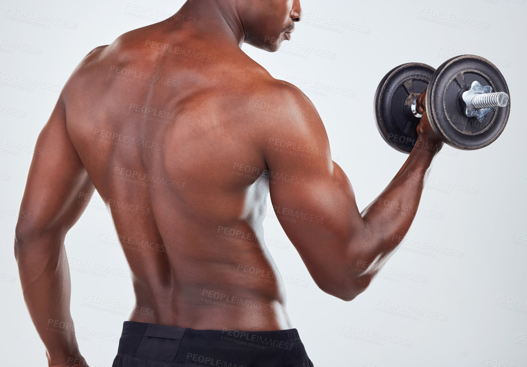 Buy stock photo Weight, dumbbells and back of black man in studio for workout, bodybuilder training and gym exercise. Fitness, sports and person weightlifting for strength, muscles or strong arms on white background