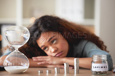 Buy stock photo Black woman, waiting and savings with slow financial and investment growth with hourglass. Investing, budget and cash interest with coins, money and banking profit with bored worker and finance delay