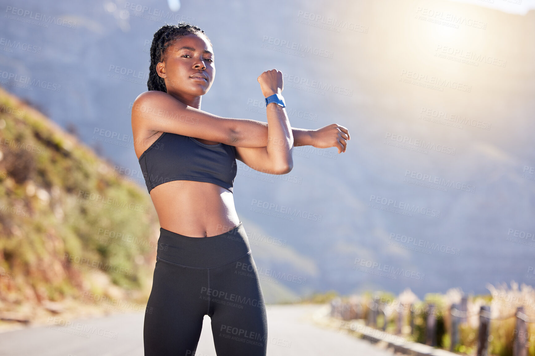 Buy stock photo Black woman, portrait and stretching arm in outdoor for warm up before running, workout and training for marathon. Girl, exercise and ready for practice on road, fitness routine and prepare for race.