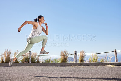 Buy stock photo Girl, running and jump on road for fitness or training, exercise and physical cardio for marathon. Female runner, wellness and practice for race outdoor, speed and fast with endurance for workout.