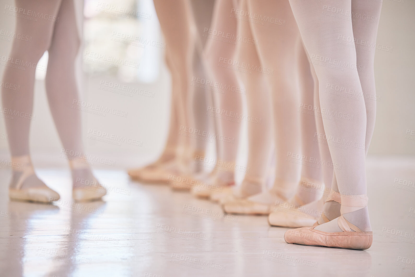 Buy stock photo Feet, ballerina and dance class with studio teacher and student group for performance and training. Ballet, teaching and legs with routine learning and practice with toe shoes of dancer in line