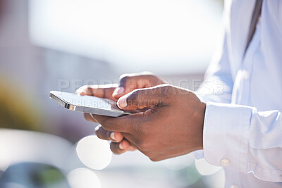 Buy stock photo Businessman, phone and hands in outdoor for typing, website scroll and online for conversation. Male person, employee and travel in city for commute, app and email business contact on social media