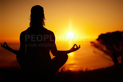 Buy stock photo Sunset, yoga and person with zen for meditation, wellness and mindfulness in outdoor nature. Silhouette, chakra and yogi with lotus pose for awareness, holistic and spiritual balance for inner peace