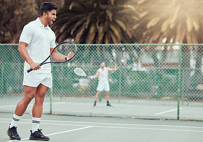 Buy stock photo Tennis, man and celebration for winning game, competition or match outdoor at sports court. Success, player or athlete cheers with racket for goal achievement, victory and excited champion fist pump