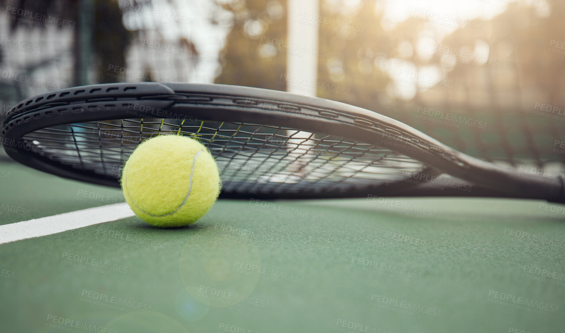 Buy stock photo Summer, tennis and ball with racket on court for sports game, competition and practice at sunset. Outdoor, match and nature with equipment at stadium for training, activity and tournament in Paris