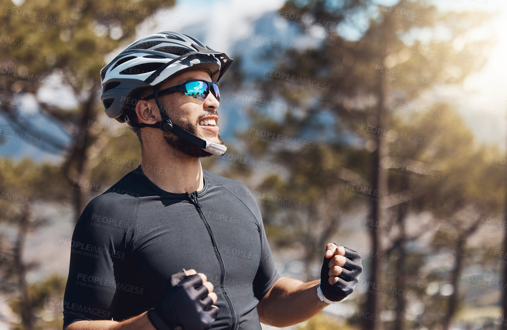 Buy stock photo Happy man, cyclist and achievement with helmet in nature for challenge, winning or victory in forest. Excited male person, athlete or biker with smile for accomplishment, fitness goals or cycling