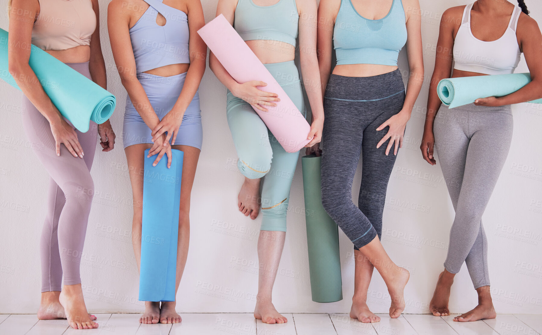 Buy stock photo Women, yoga mat and studio with feet, fitness and wellness for mindful, wellbeing and health. Group of people, legs and gym for balance, class and together for physical activity, training or practice