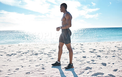 Buy stock photo Black man, relax and fitness from running on beach for marathon training, exercise and cardio wellness. African, male person and shirtless for rest, peace and morning routine for health outdoor