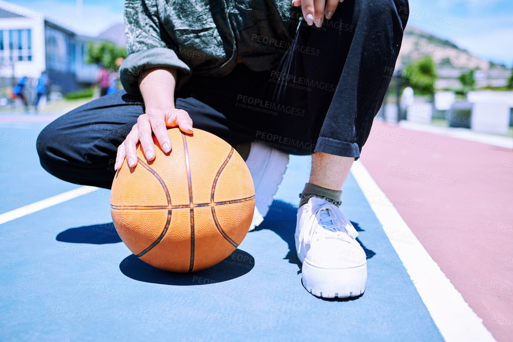 Buy stock photo Hands, basketball and person on court for fashion, fitness and cardio in summer with sunshine. Wellness, clothes and influencer or gen z with style for outdoor sport or exercise in urban city