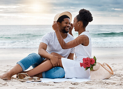 Buy stock photo Black couple, happy and relax on sand by beach for romantic date on vacation, anniversary getaway and bonding. Man, woman and together for ocean escape, holiday and commitment for love connection.