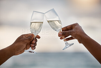 Buy stock photo Sunset, couple and hands toast with wine glass, having fun or celebrating together for anniversary. Vacation, champagne and people cheers with alcohol drink for marriage on holiday, summer and beach