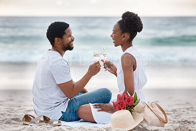 Buy stock photo Black couple, toast and relax on sand by beach for romantic date on vacation, anniversary getaway and bonding. Man, woman and together with white wine, ocean escape and commitment for love connection