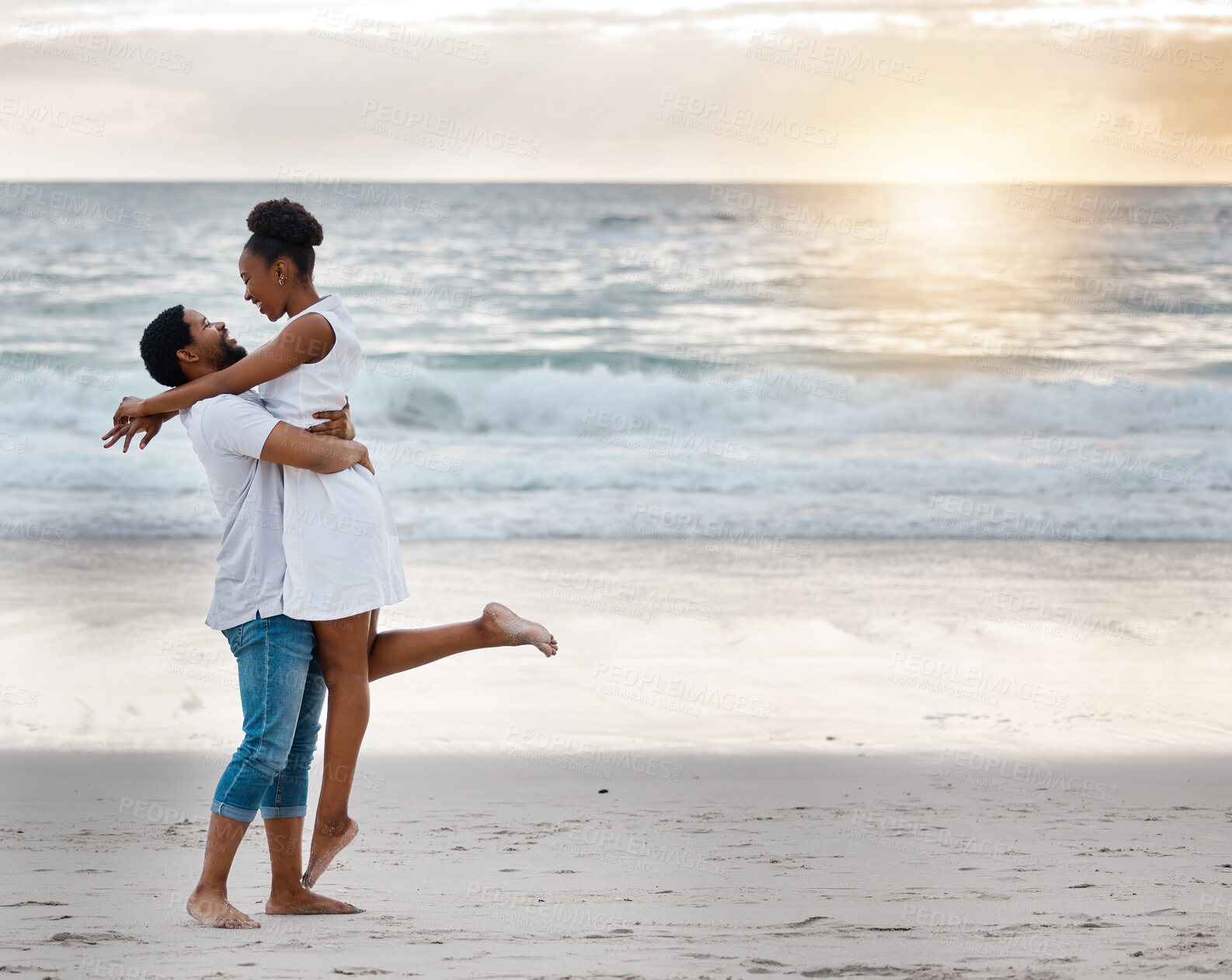 Buy stock photo Sunset, black couple and hug with love, beach and celebrating together for anniversary. Vacation, honeymoon and people relax with romance, travel and marriage on summer holiday and Miami ocean