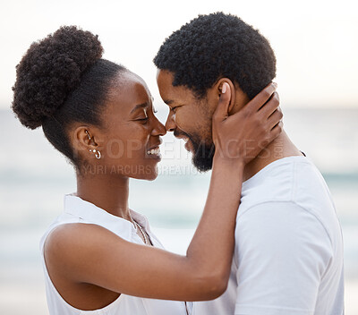 Buy stock photo Embrace, black couple and smile with love, beach and celebrating together for anniversary. Vacation, honeymoon and people relax with romance, travel and marriage on summer holiday and Miami ocean