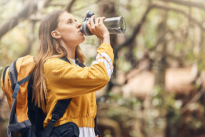 Buy stock photo Woman, relax and drinking water from hiking outdoor for fitness hydration, exercise and health of nature adventure. Active, female person and backpack morning, liquid break and trekking journey peace