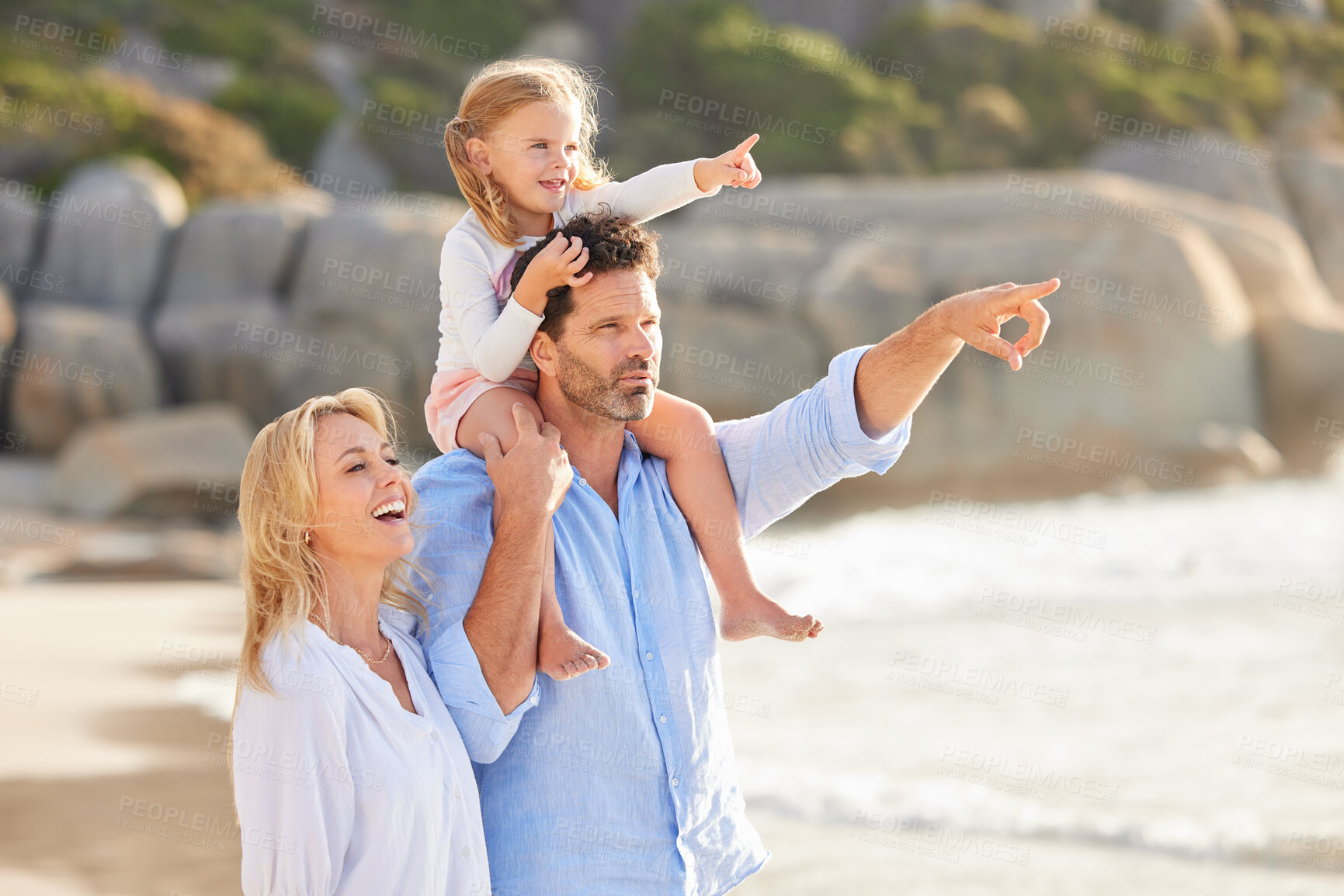 Buy stock photo Parents, girl and pointing in beach with shoulder ride for walking on break and holiday in Australia. People, family and happy with kid for vacation, journey  and adventure in seaside for bonding