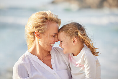 Buy stock photo Beach, smile and love of mom for girl, child or daughter in Miami nature on holiday or vacation with heads touching. Mother, woman and kid with ocean, sea and travel adventure for happy break