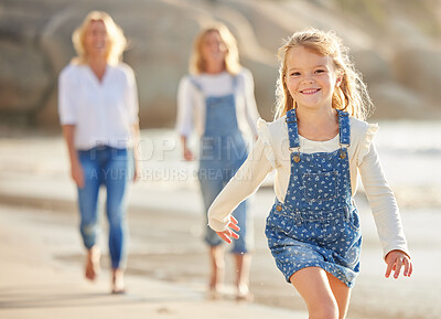 Buy stock photo Girl child, portrait and beach fun with family for vacation, freedom and walk in ocean water. Kid, happy or parents on seashore for holiday, travel or enjoyment in sunshine with support, care or love