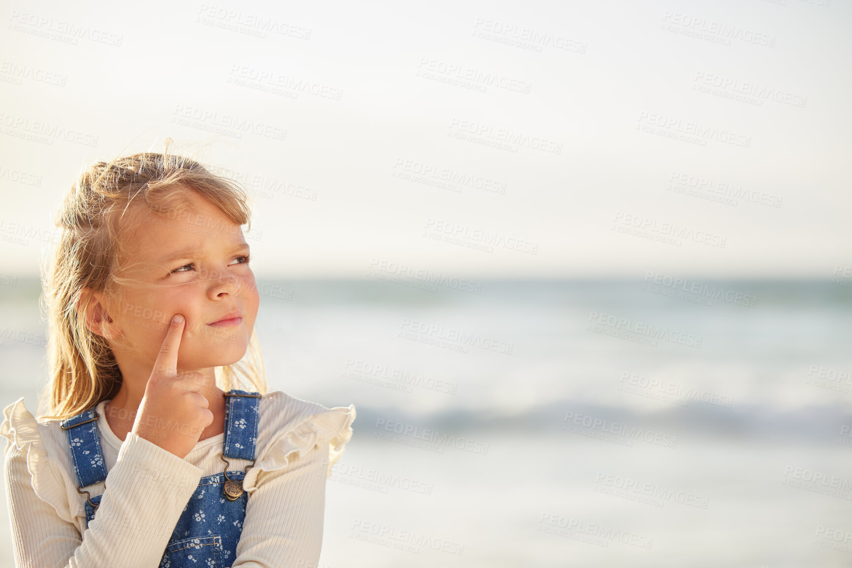 Buy stock photo Thinking, beach and girl with vacation, holiday and view for Miami seaside and getaway trip. Child, outdoor and nature with kid, travel and ocean for summer break with weekend and relaxing waves