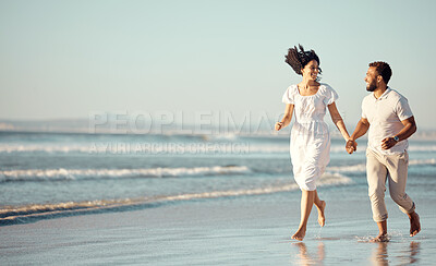 Buy stock photo Couple, running and holding hands on beach with love for travel journey, care and bonding on marriage date by ocean. Relax, woman and man with support, trust and morning on vacation for peace outdoor