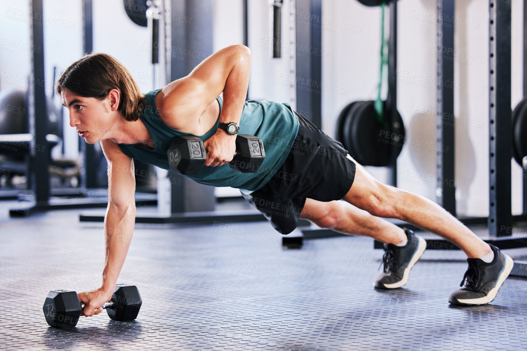 Buy stock photo Fitness, dumbbell and push up with a man at gym for a workout, biceps exercise or training. Male athlete person with iron weights for strong muscle, focus and agile performance at wellness club