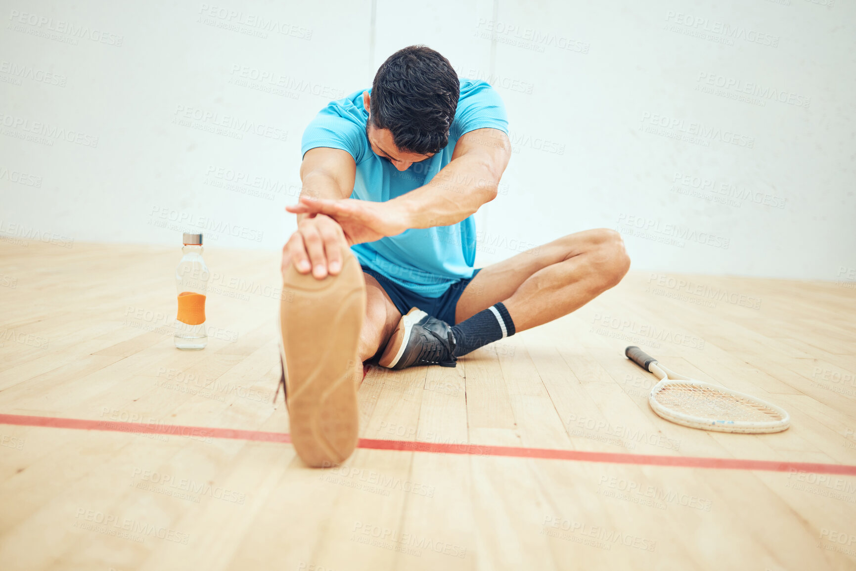 Buy stock photo Stretching, exercise and man in court, game and active for playing in sports, training and practice. Serious, sportsman and confident of tournament, squash player and fitness of person and athlete