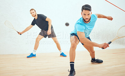 Buy stock photo Men, playing and court or squash match, rubber ball and racket for sport with energy or fitness in challenge. Athlete, friends and competing in active hobby, wooden floor and training for competition