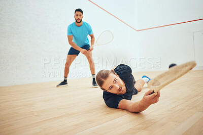 Buy stock photo Men, play and court or squash match, rubber ball and racket for sport with energy or fitness in challenge. Athlete, volley save and competing in active hobby, wooden floor and training or competition