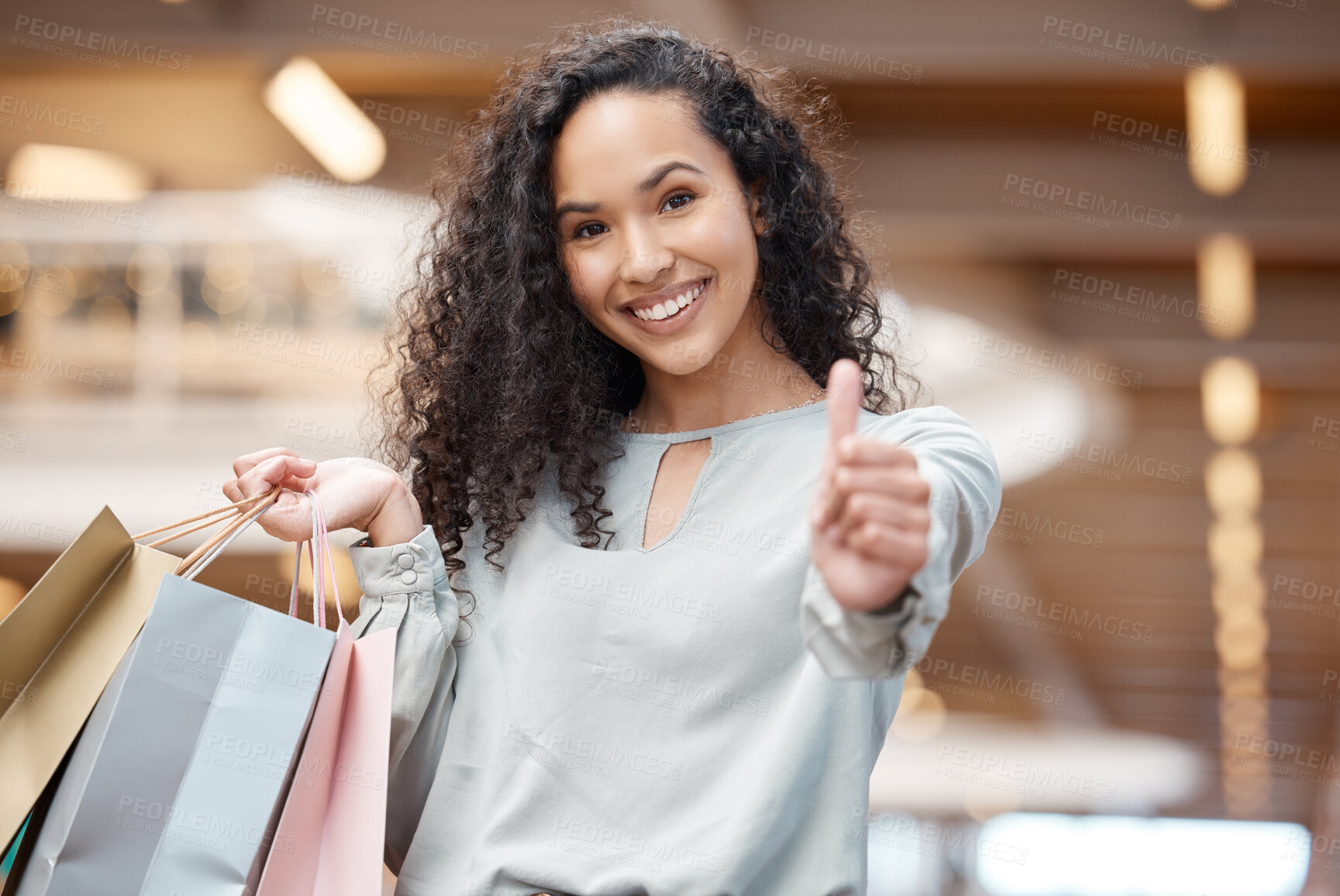 Buy stock photo Happy woman, portrait and shopping bags with thumbs up for purchase, buying or discount sale at mall. Young female person or shopper with smile, like emoji or yes sign for satisfaction or good review