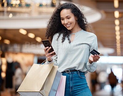 Buy stock photo Happy woman, shopping bags and phone with credit card at mall for easy payment or ecommerce. Female person or shopper with smile on mobile smartphone for fashion, online fintech or simple banking