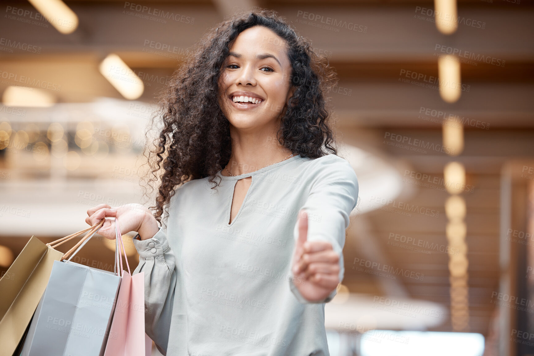 Buy stock photo Happy woman, portrait and shopping bags with thumbs up for discount sale, purchase or buying at mall. Young female person or shopper with smile, like emoji or yes sign for satisfaction or good review