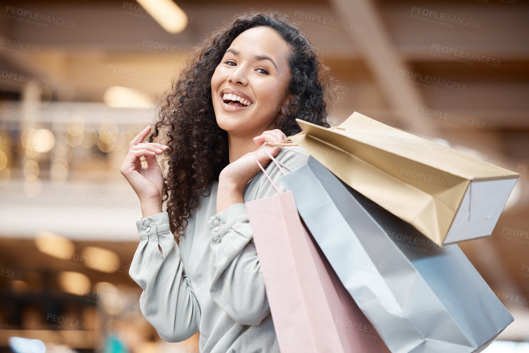 Buy stock photo Happy woman, portrait and sale with shopping bags at mall for indoor purchase, deal or buying spree. Young female person, customer or shopper with smile for gift, present or discount at retail store