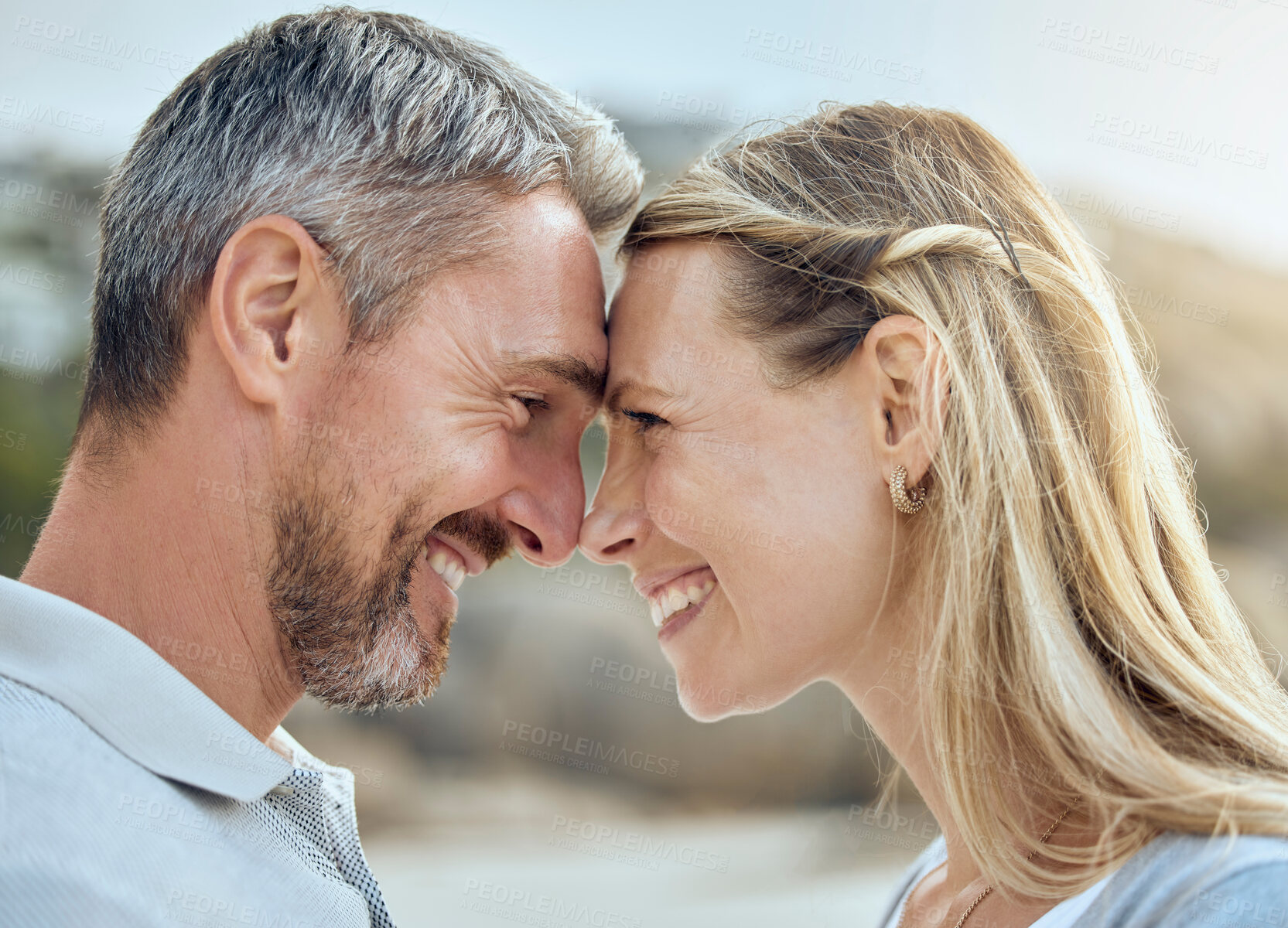 Buy stock photo Mature, happy man and woman at beach for love, trust and smile or support for relationship. Together, couple and date in nature for anniversary or travel, marriage and respect for outdoor adventure