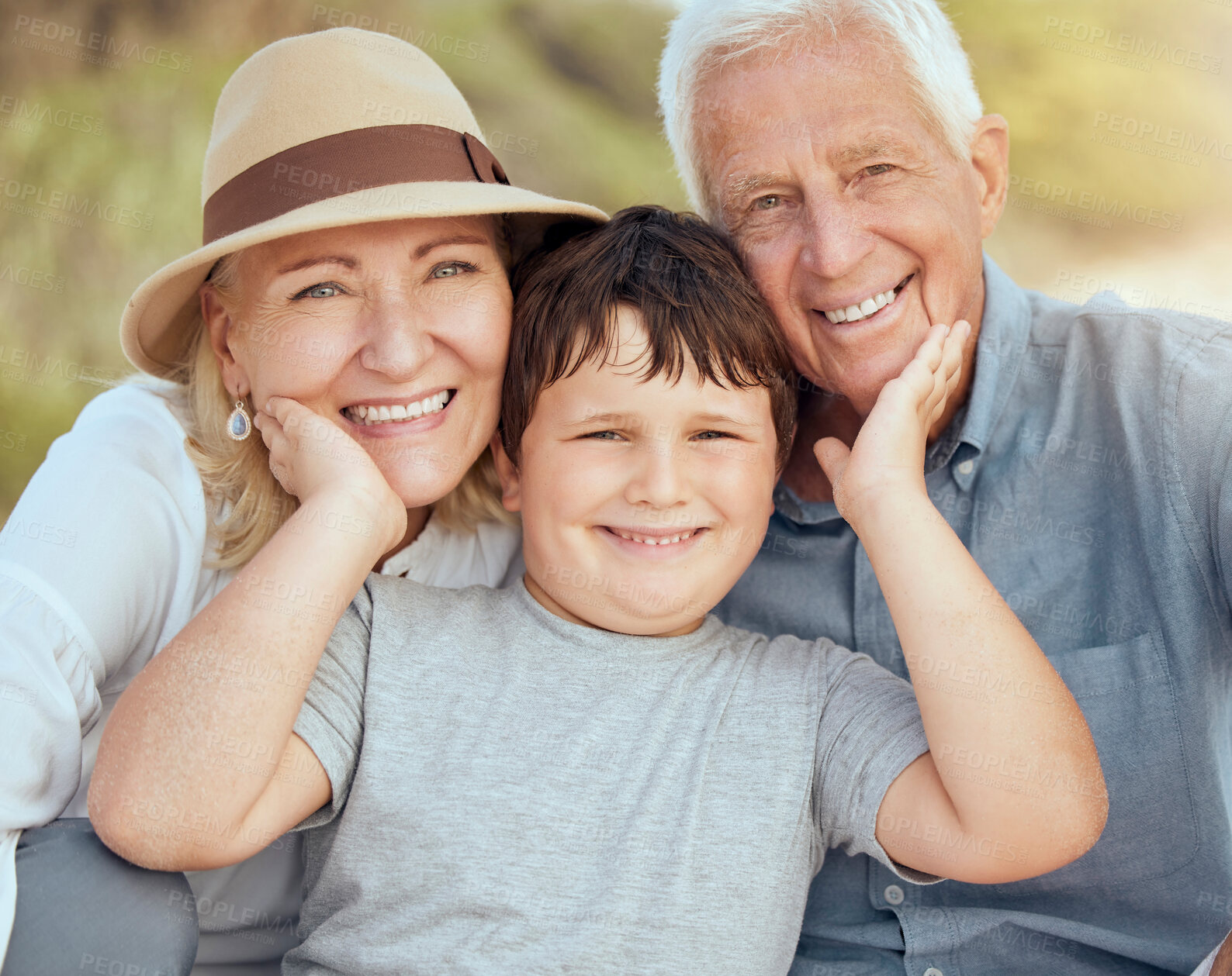 Buy stock photo Family, portrait of grandparents or happy child at beach for summer fun, bonding or support in nature. Seniors, young boy or smile with hug for care, relationship development and trust in Australia