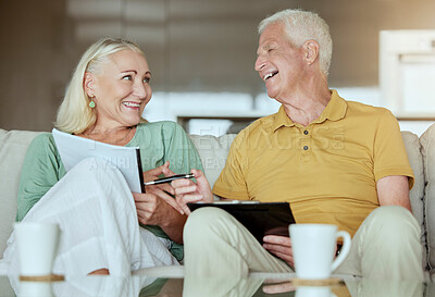 Buy stock photo Mature couple, home and happy with paperwork for house finance, savings and retirement plan. People, relationship and smile in living room with document or contract for life policy or insurance