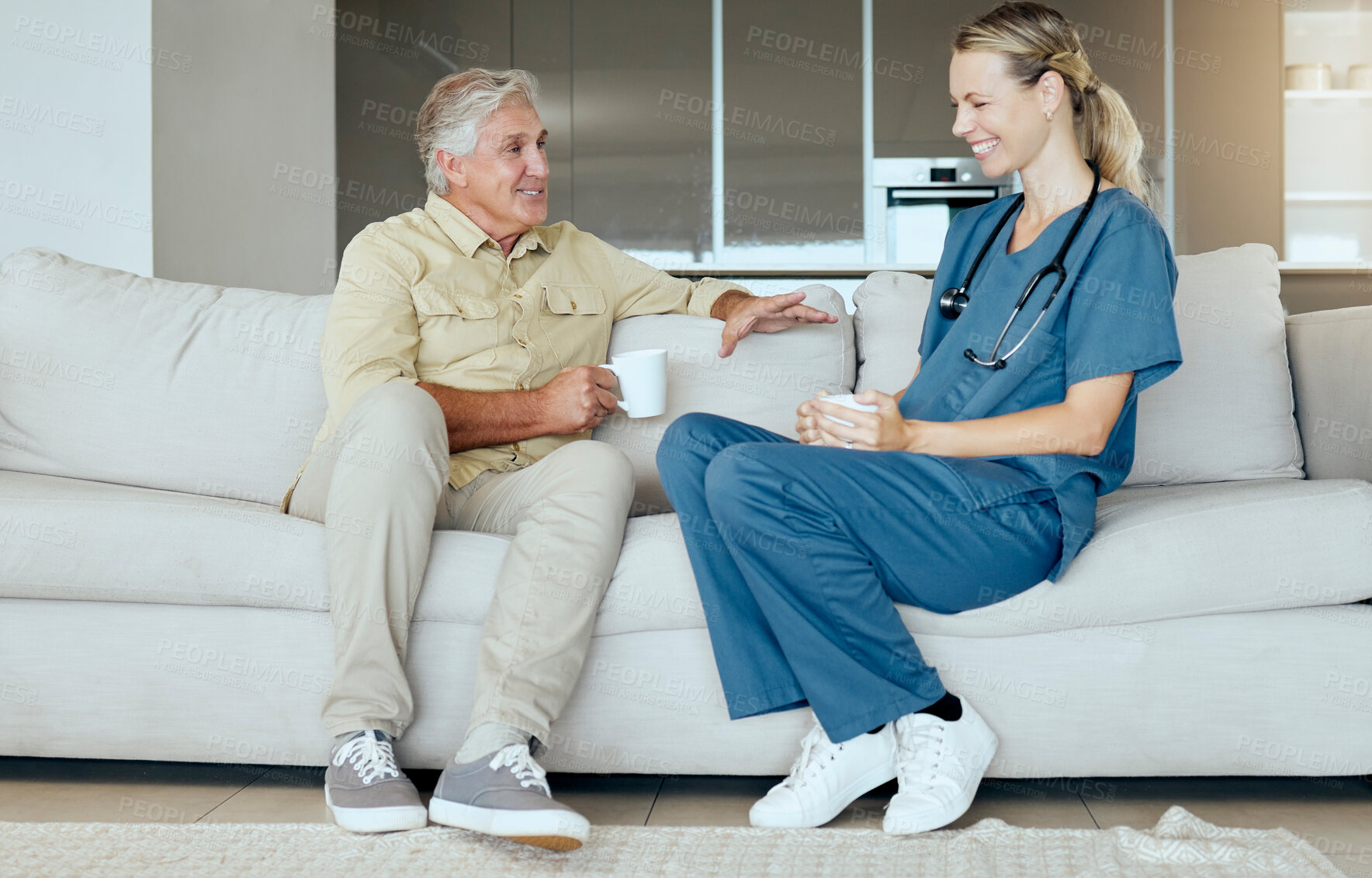 Buy stock photo Coffee, laughing or visit with nurse and old man on sofa in retirement home living room for healthcare. Funny, joking or medical with senior patient and woman caregiver talking in apartment together