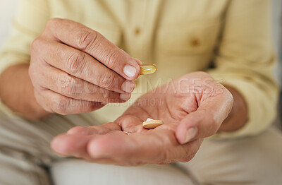 Buy stock photo Elderly man, hands and pills or treatment in house, illness management and prescription drugs or hypertension. Capsule, antibiotic and pharmaceutical product in retirement, patient and health routine