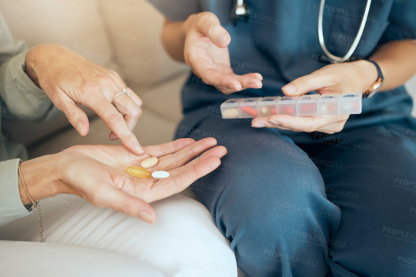 Buy stock photo Senior care, woman and nurse with pills in house, illness management and discussion with medication. Nursing home, medical insurance and caregiver for hands, pharmaceutical and wellness service