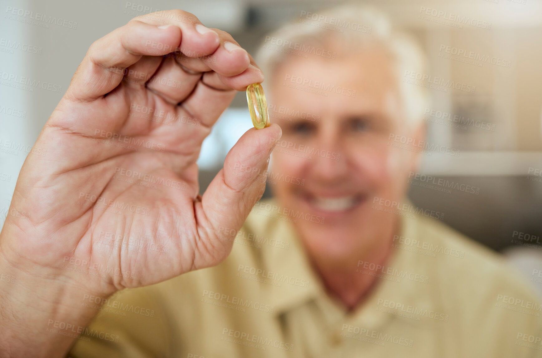 Buy stock photo Senior, man and hand with pill in home for medication, pharmaceutical treatment or chronic illness. Mature, person and capsule medicine for routine supplement, prescription drugs or retirement health