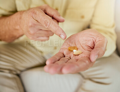 Buy stock photo Senior man, hands and pills for treatment in house, illness management and prescription drugs or hypertension. Capsule, antibiotic and pharmaceutical product in retirement, patient and health routine