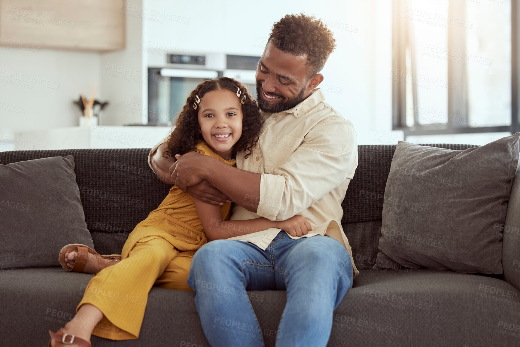 Buy stock photo Hug, sofa and child with father in home for love, care and bonding together on weekend. Smile, connection and girl kid embracing single dad for relax in living room on weekend at house in Colombia.