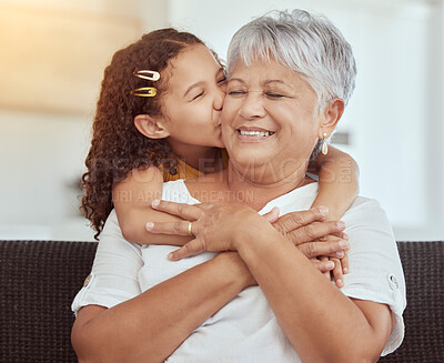 Buy stock photo Grandmother, child and kiss for love in home, affection and bonding or care in apartment living room. Family, grandchild and grandma on couch and happy on weekend, comfort and smile in house lounge