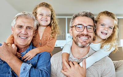 Buy stock photo Portrait, dad and grandfather hug children in home living room for care, love or support. Face, generations and smile of sisters with father for piggyback, connection or happy family bonding together