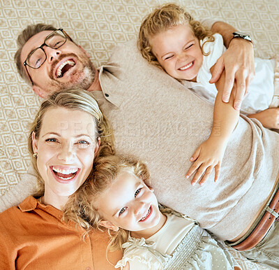 Buy stock photo Family, excited and above with children on bed at house for love, bonding and security for care for calm break. Man, woman and kids for support, fun and trust on weekend together of childhood memory