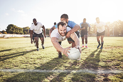 Buy stock photo Rugby, man and diving with ball for touchdown or win score with a try, tackle and competitive sports or game. Team, athlete and field for football or running for championship tournament and match.