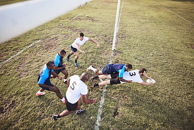 Buy stock photo Rugby, team and diving with ball for touchdown or win score with a try, tackle and competitive sports or game. Above, athlete and field for football or running for championship tournament and match.