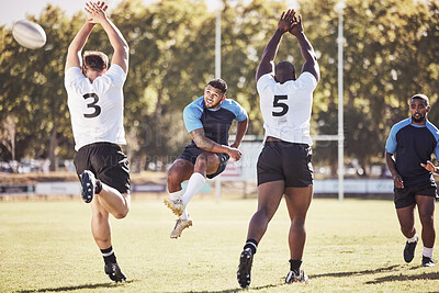 Buy stock photo Sports, drop kick and rugby players on field for training, match or skill development for try. Fitness, defense and team with ball to score penalty at practice, game or hobby with opponent at stadium