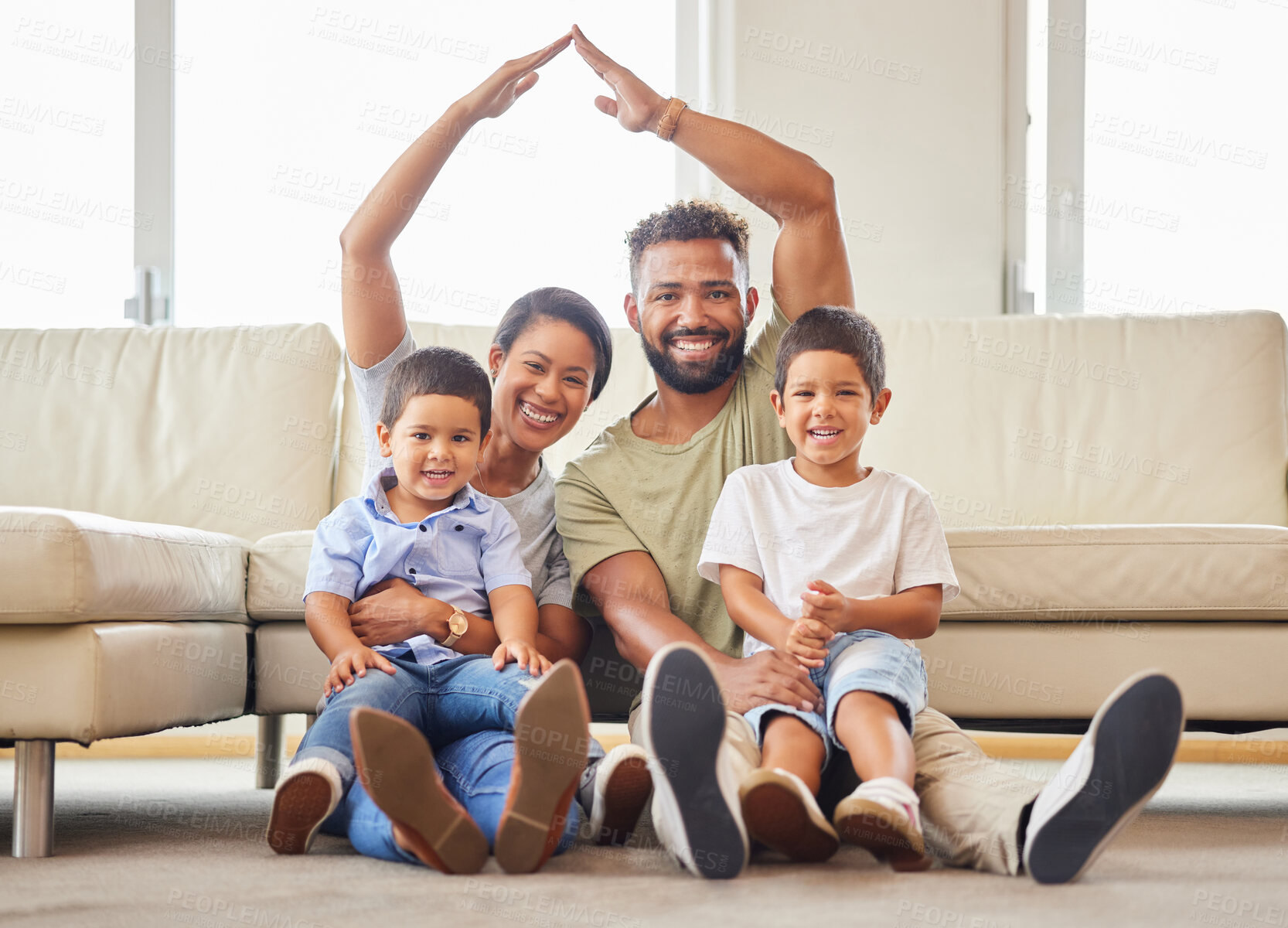 Buy stock photo Family, portrait and hands with roof in home for protection, real estate insurance and mortgage cover on floor. Happy people, parents and children in living room with property investment and support