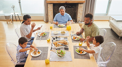 Buy stock photo Happy family, lunch and eating food at table together for holiday celebration, bonding and sharing a meal. People, parents and grandfather with kids in home for dinner, social gathering and top view